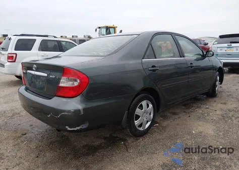 2003 Toyota Camry Le z USA, uszkodzony, nr VIN 4T1BE32K23U773023